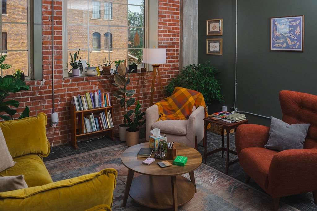Image of a welcoming therapy office in Wichita, Kansas, with large windows and warm lighting.