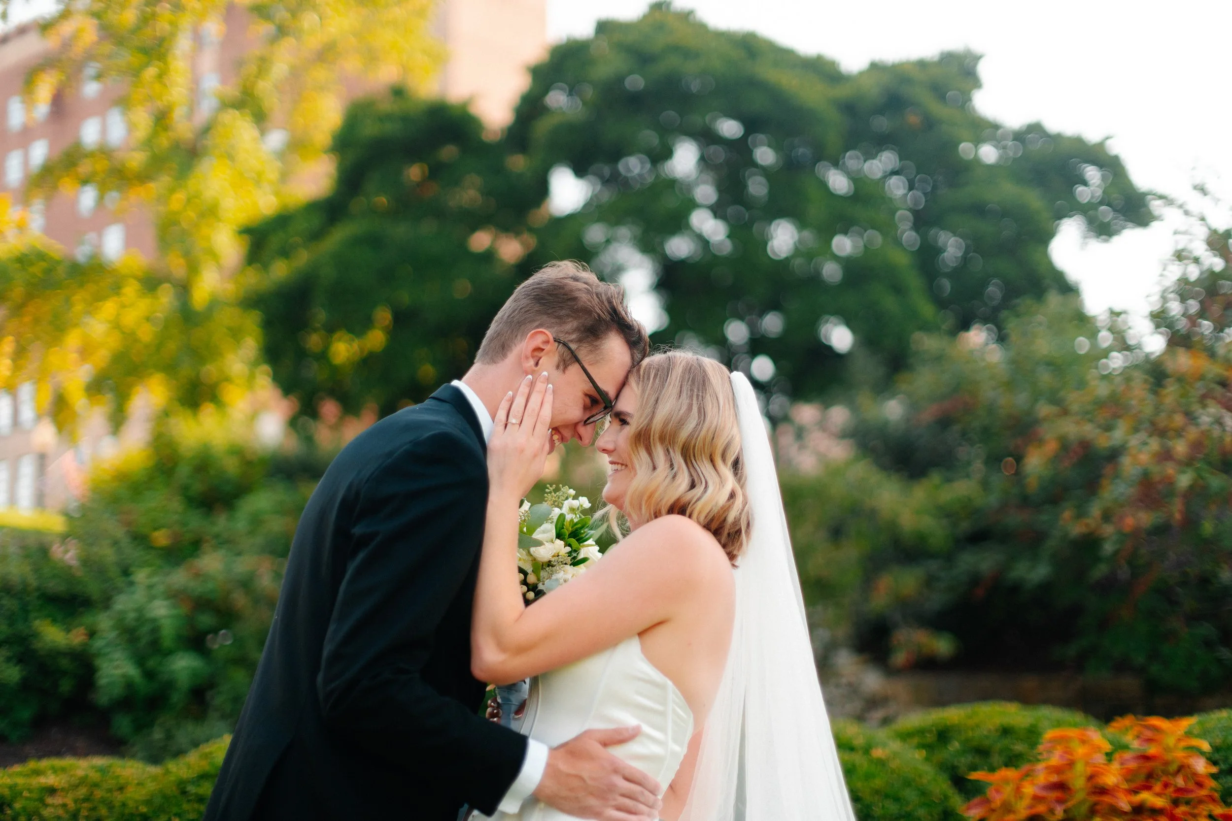 Bride and groom holding each other at their wedding in Jefferson City, Missouri