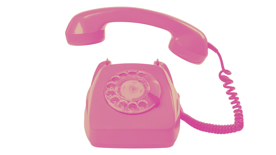 Pink rotary phone with a coiled cord and a rotary dial.