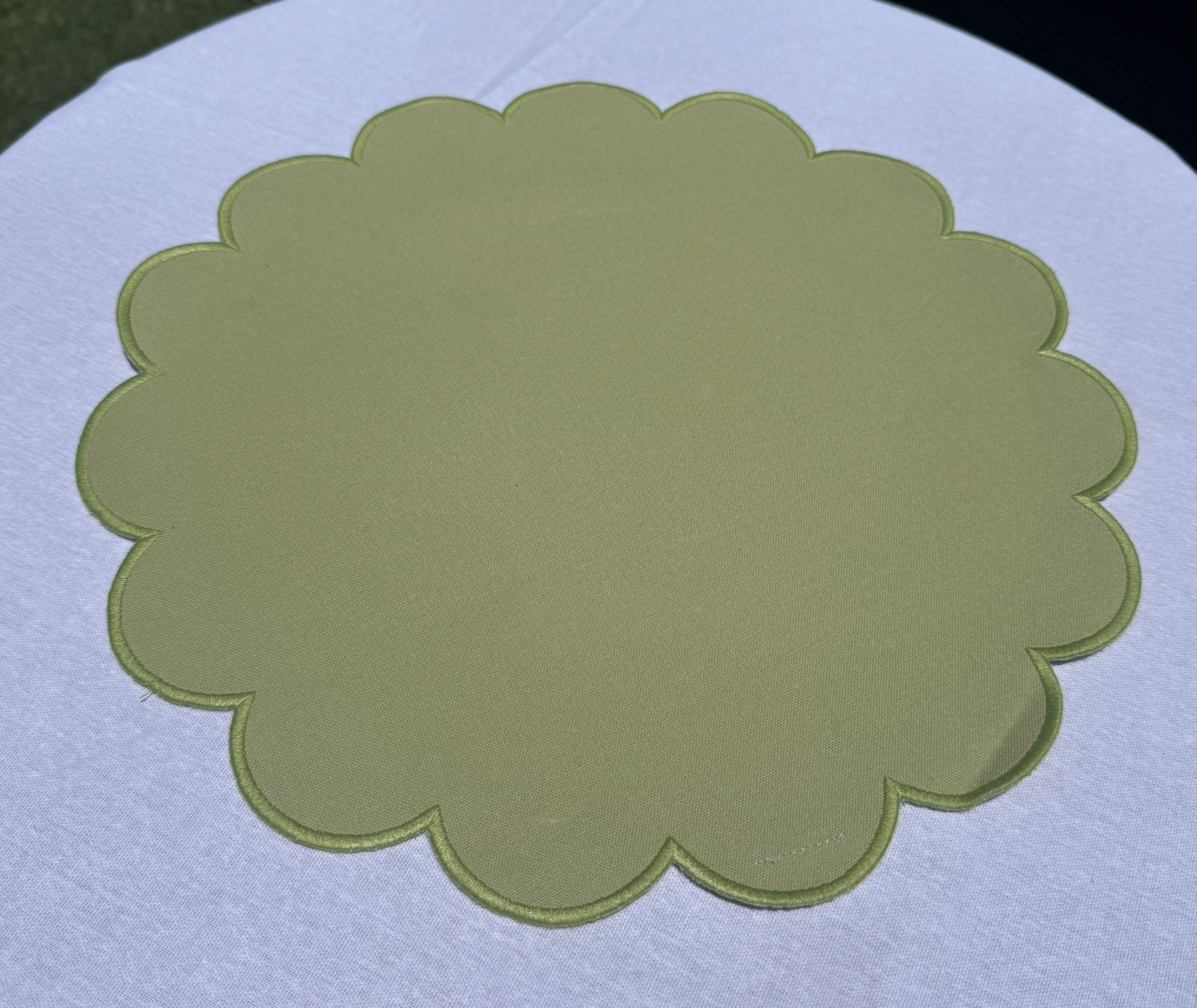Green scalloped placemat