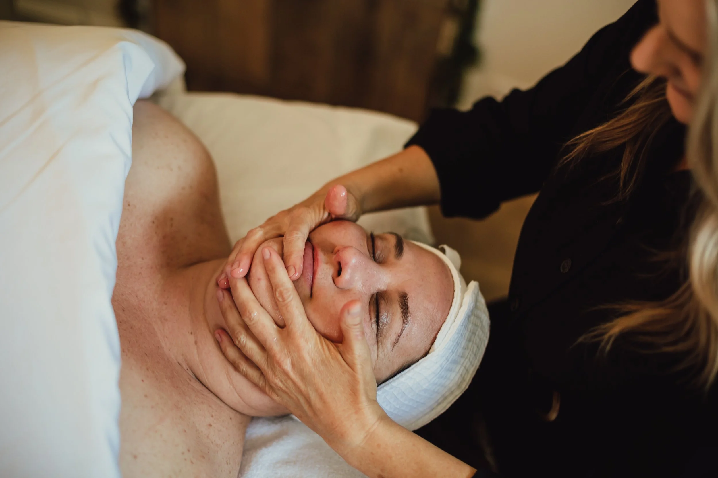 Face modeling facial treatment with sculpting massage and skincare therapy