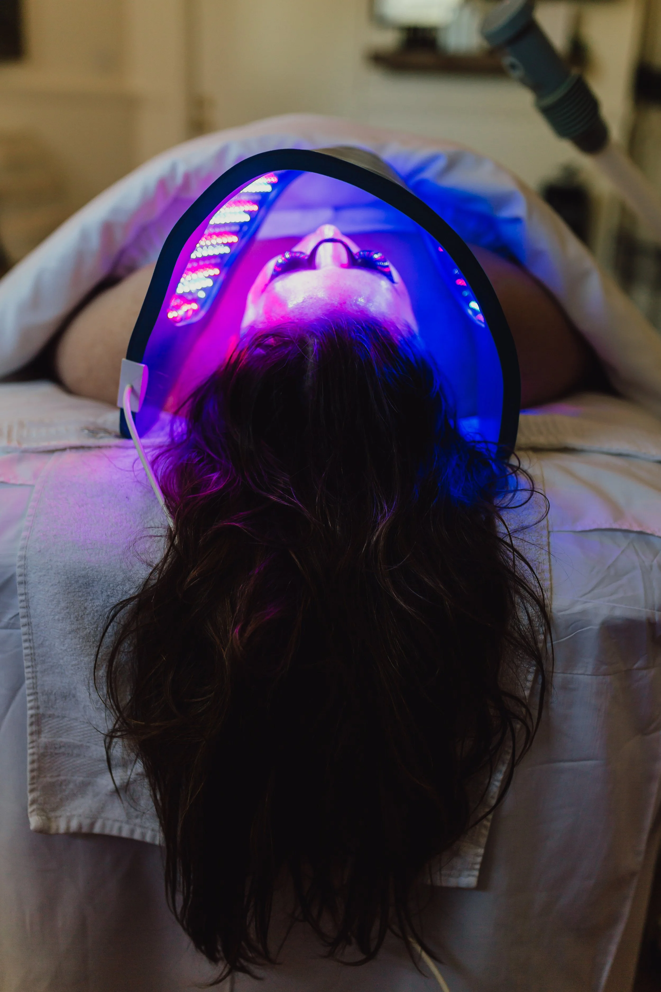 LED light therapy facial treatment session