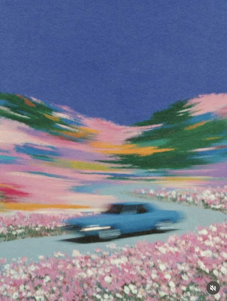 A blurry painting of a blue car driving through a field of pink and white flowers with a colorful sunset sky and mountains in the background.