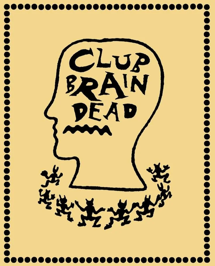 A beige background with a black outline of a human head profile. Inside the head, it says "CLUB BRAIN DEAD" in stylized black letters. Below the head, there are several small, dancing devil-like figures holding hands in a semi-circle.