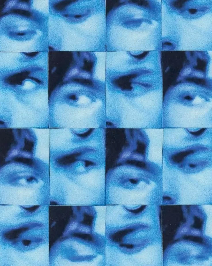 A grid of sixteen individual close-up blue-tinted photographs showing different facial expressions and eye movements.