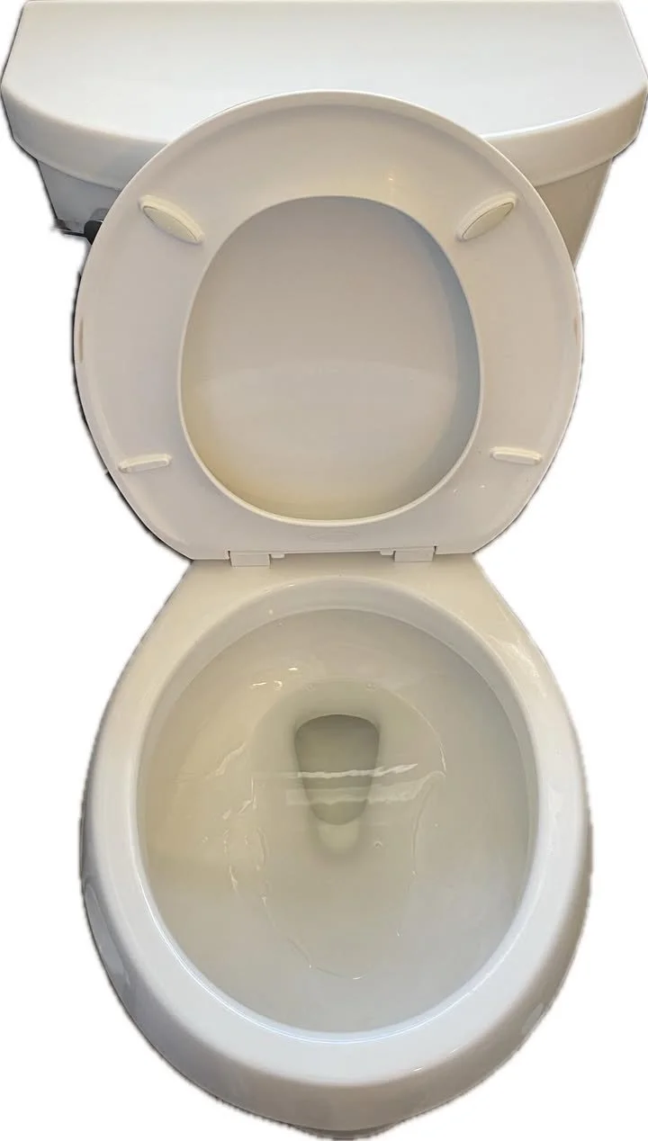 A white toilet with the lid open, showing the bowl and the tank behind it.