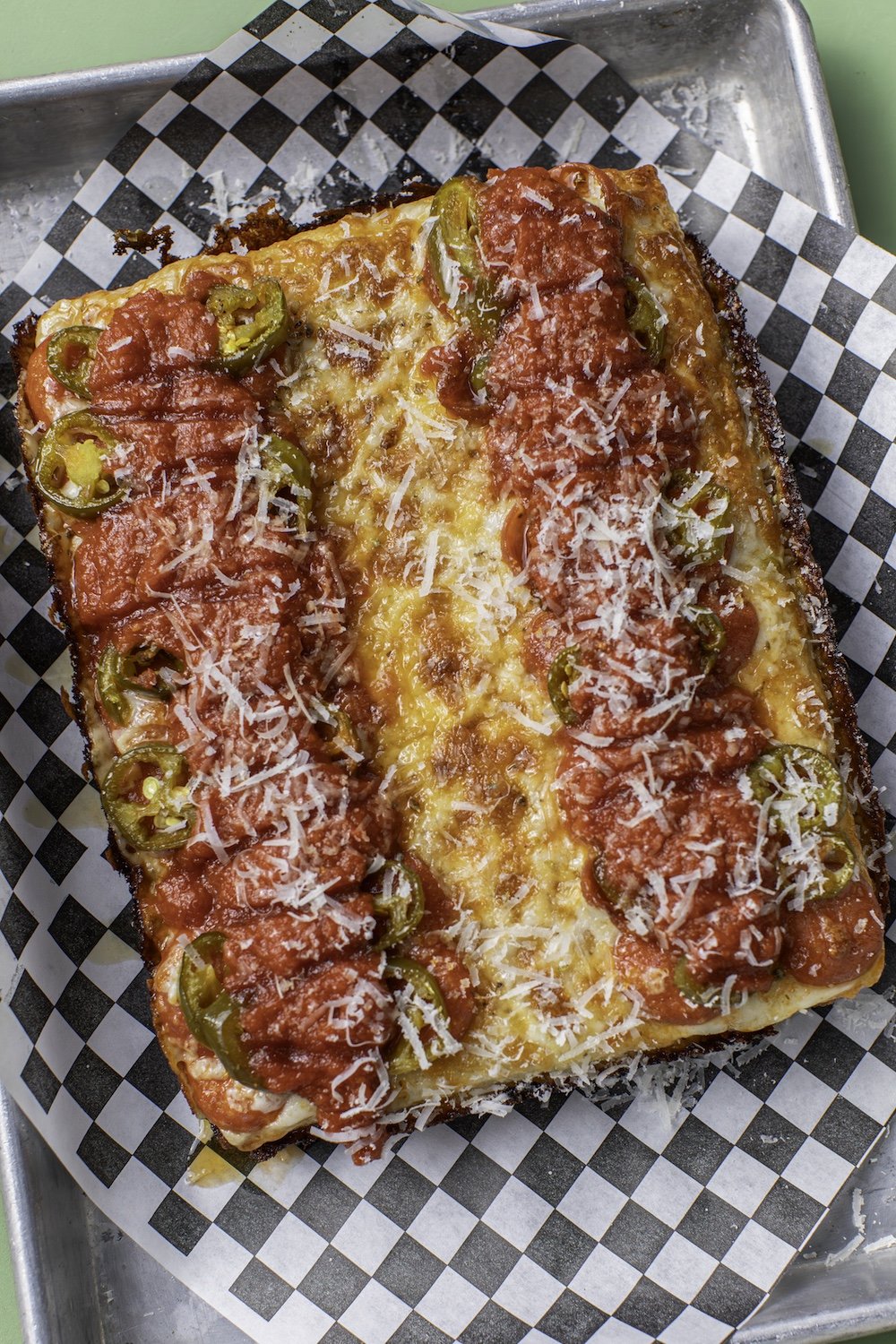 Grande cheese, pepperoni, pickled jalapenos, Cali vine-ripened tomato sauce, caramelized cheese skirt, finished with Mike's Hot Honey