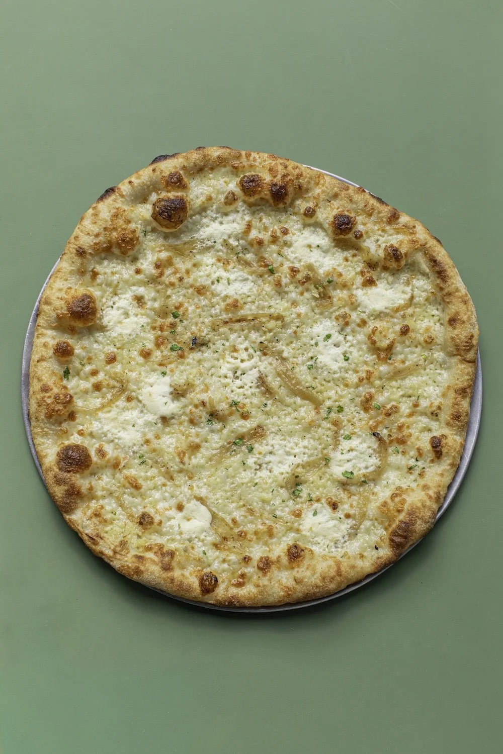 Garlic crema, roasted garlic, caramelized onions, Grande mozz, whipped ricotta, black pepper and garlic oil to finish