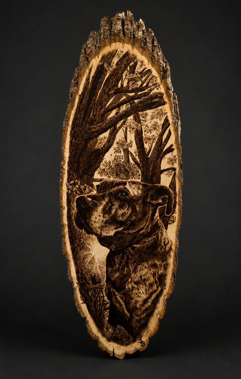 Wooden art piece featuring a detailed image of a dog's head, set against a background of trees and foliage, with intricate wood burning details.