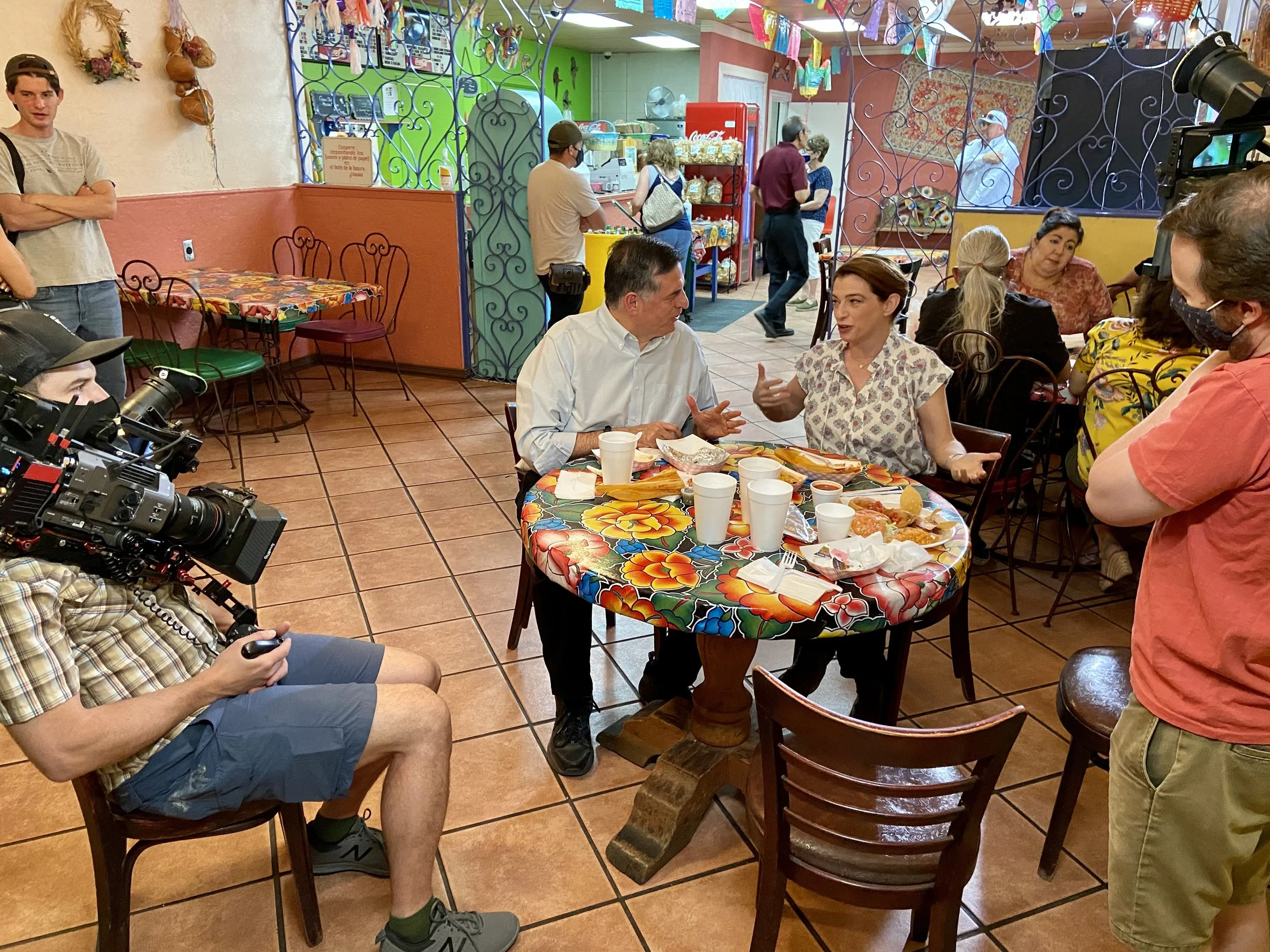 Sergio Troncoso talking with Pati Jinich about Nepantla Familias at La Tapatia in Ysleta, TX, 2021.