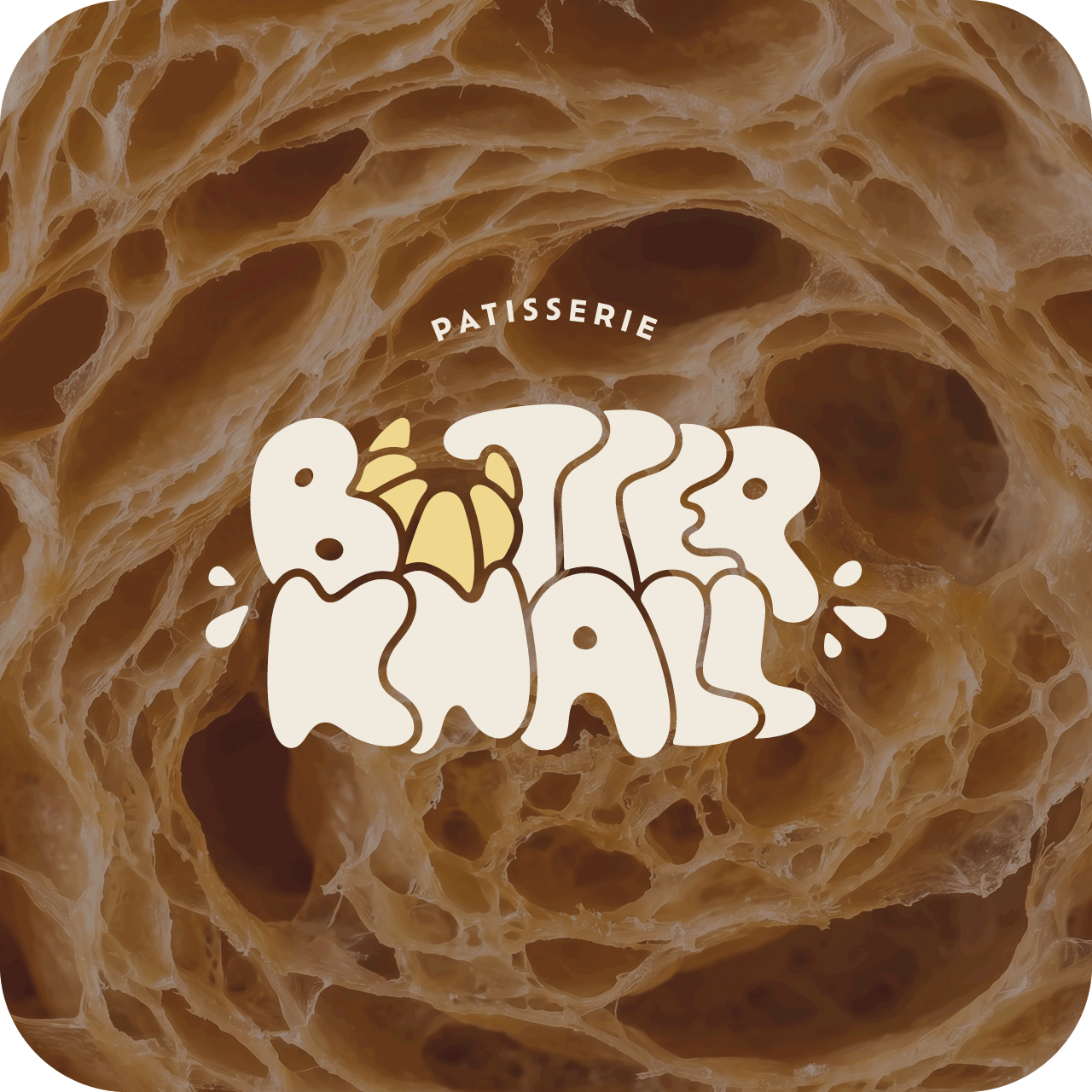 Wortmarke Butterknall mit Butterklecks-Motiv auf einer Croissant-Nahaufnahme