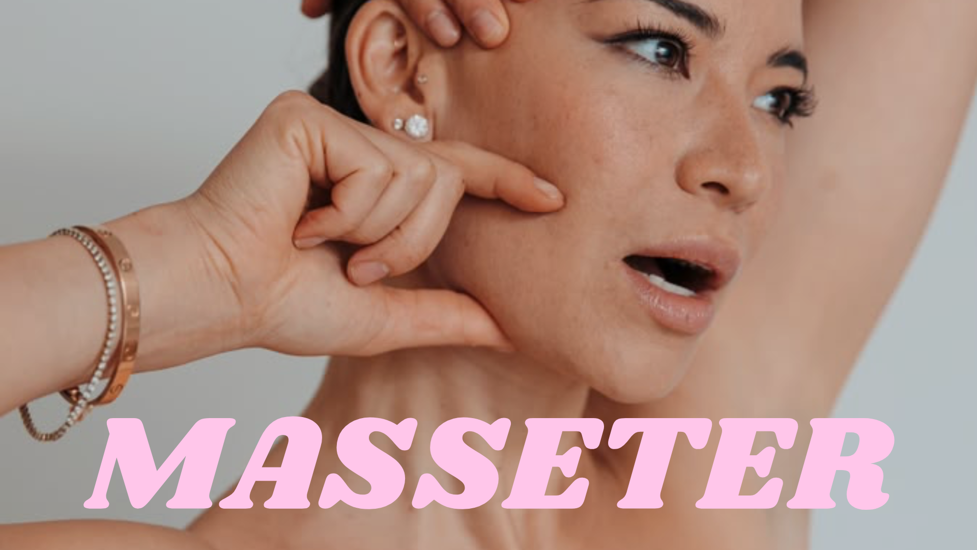 A woman receiving a facial massage with a beautician's hand, close-up of her face and neck, with the word 'MASSETER' in pink letters at the bottom.