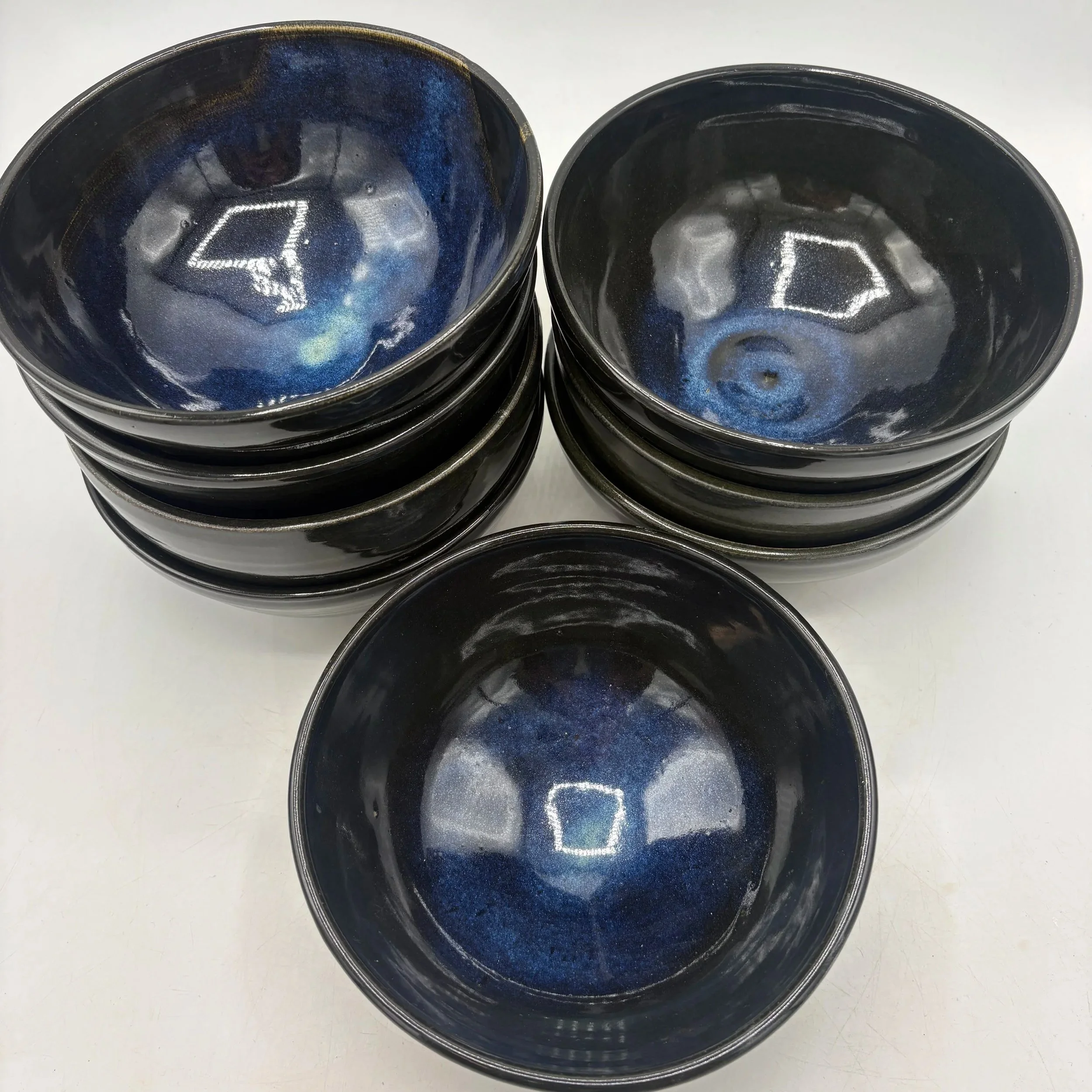 Wheel thrown bowl set, fired to cone 06 oxidation