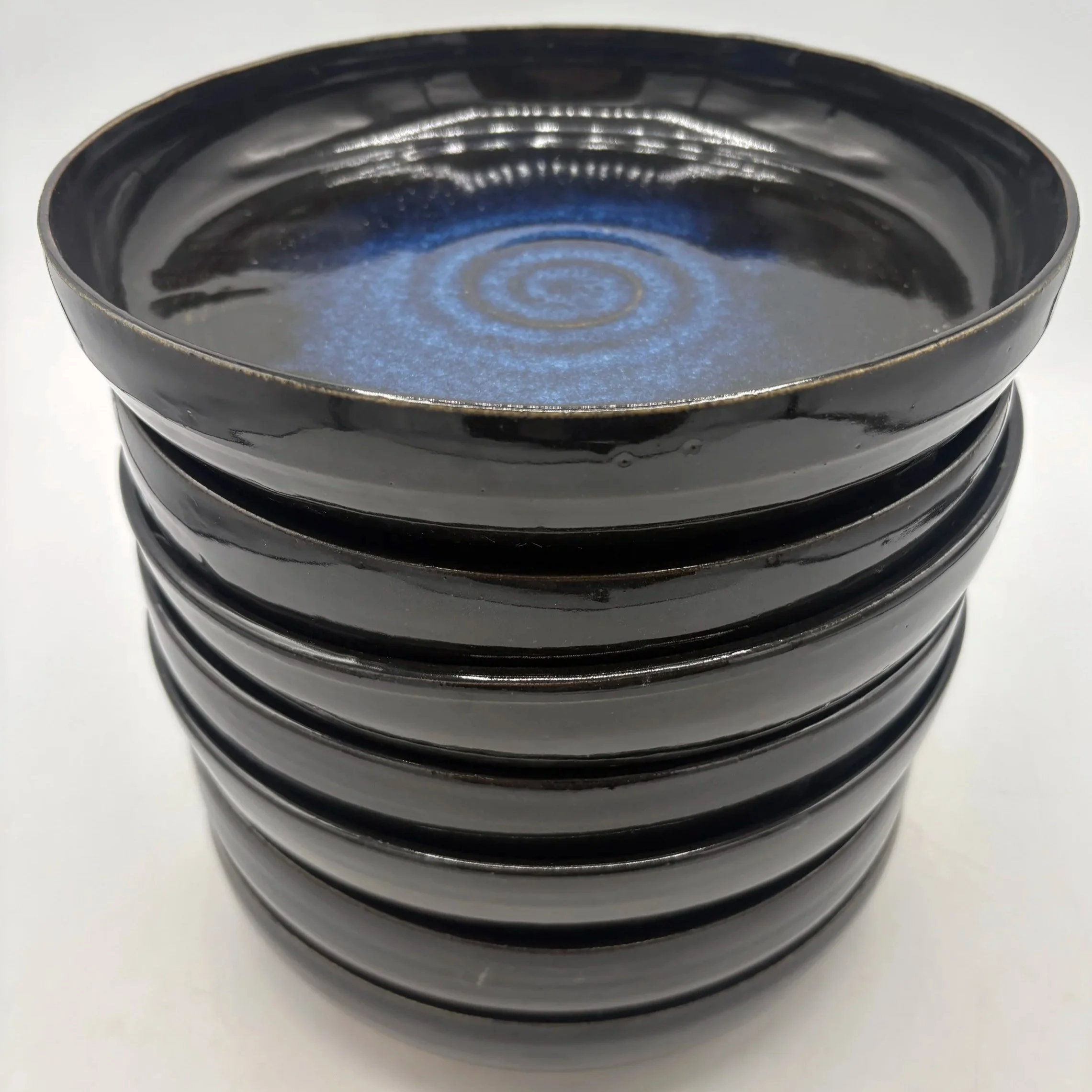 Wheel thrown plate set, fired to cone 06 oxidation