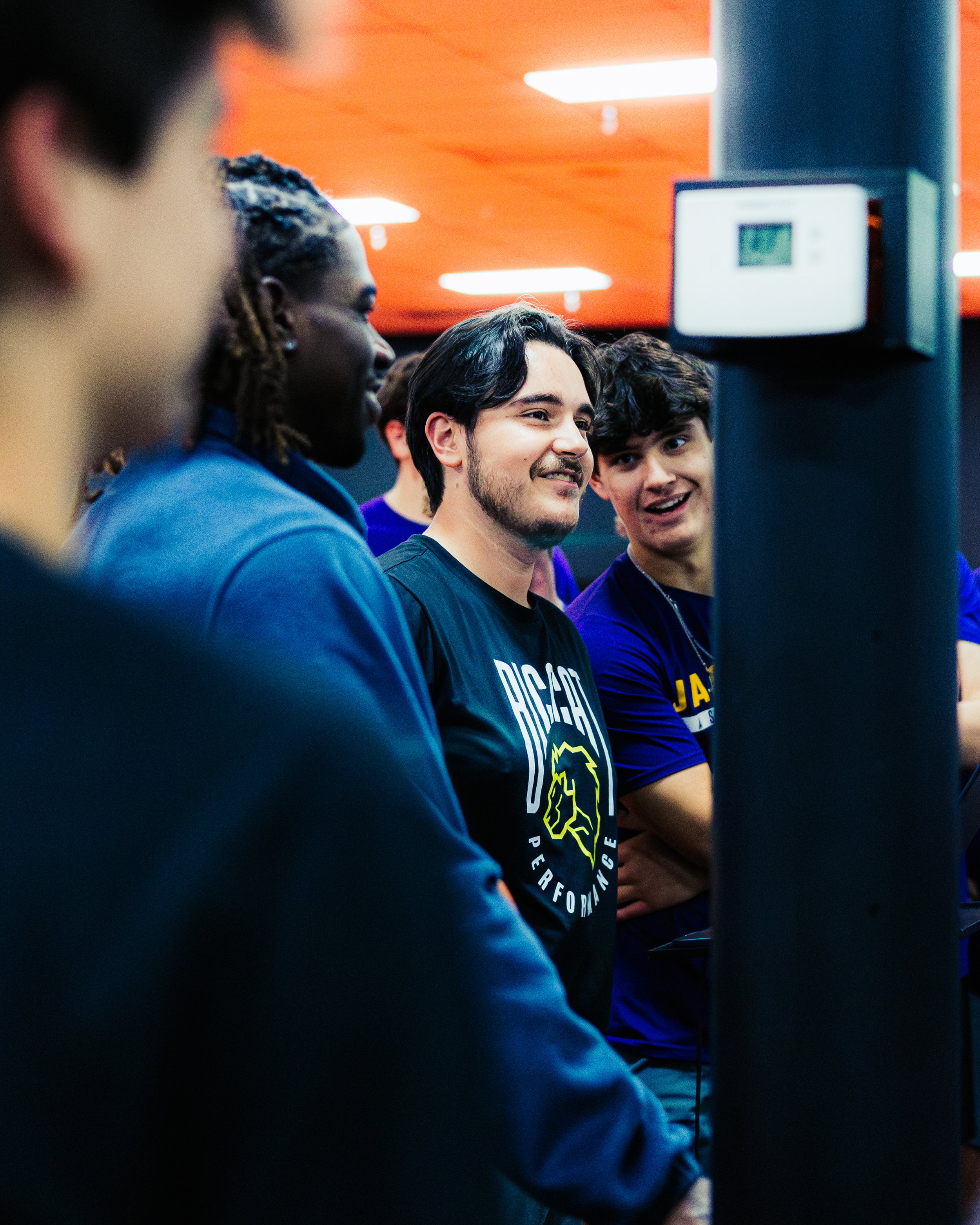 Nick LeMay, Big Cat Performance Strength Coach, gathered together in the weight room of Big Cat Performance & Physical Therapy with Jackson Baseball.