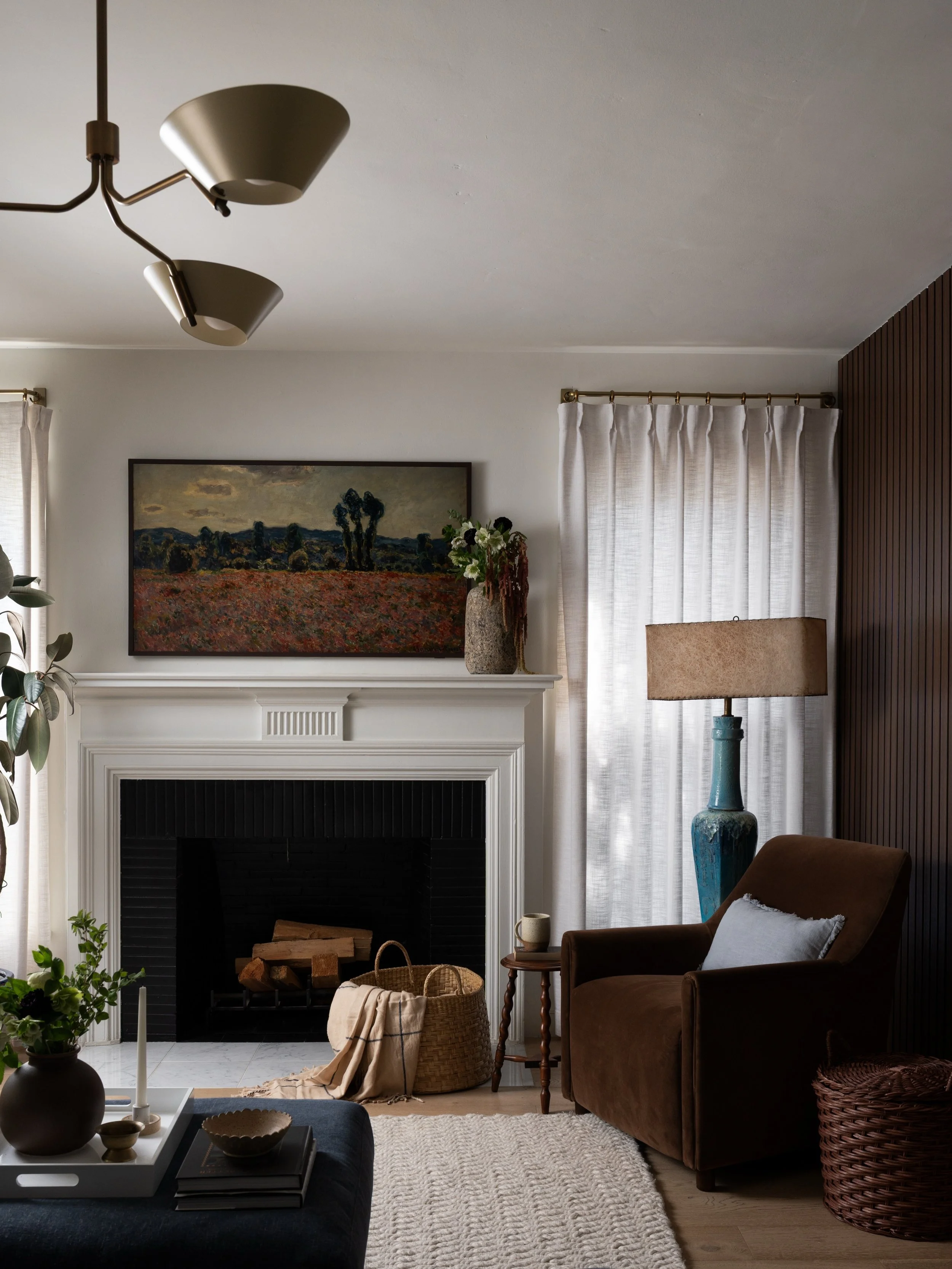 The corner of this living room is one of my favorites. A chunky knit rug, linen curtains, and velvet chair add the texture and warmth, while the vintage lamp adds an unexpected color to the mix. 

Project #StayInCherry
Design/styling @stayinteriors_l