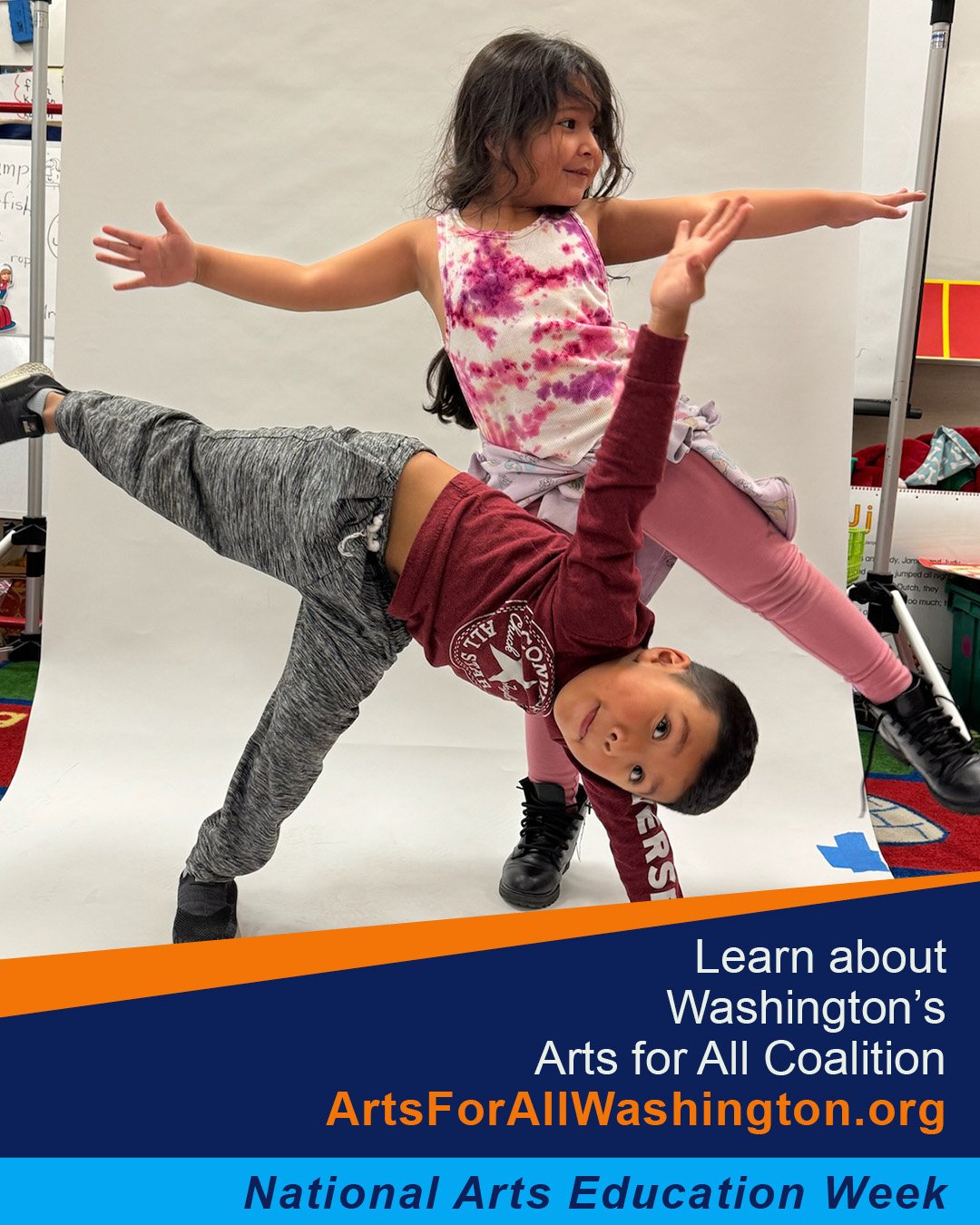 Two young people spread their limbs like snowflakes, one tipped onto one hand and one foot. One balances on only one foot. FY25 ArtsWA grantee, Carnegie Picture Lab, Photo by Tia Kramer. Banner below image: Learn about Washington's Arts for All Coali