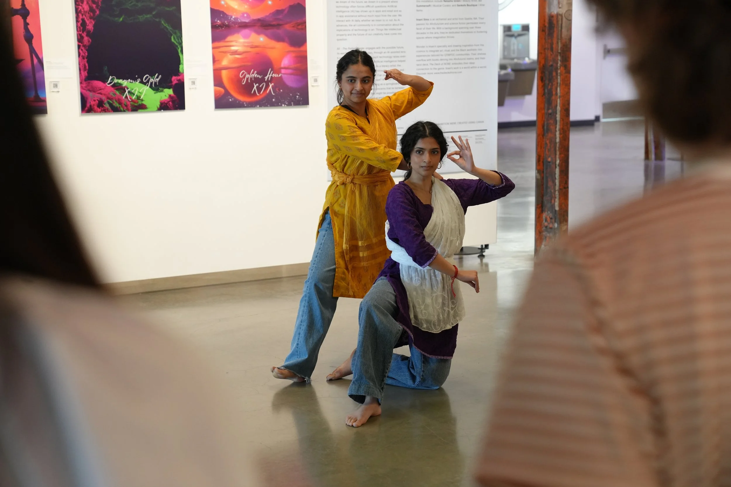 Photograph of two high school age girls dancing