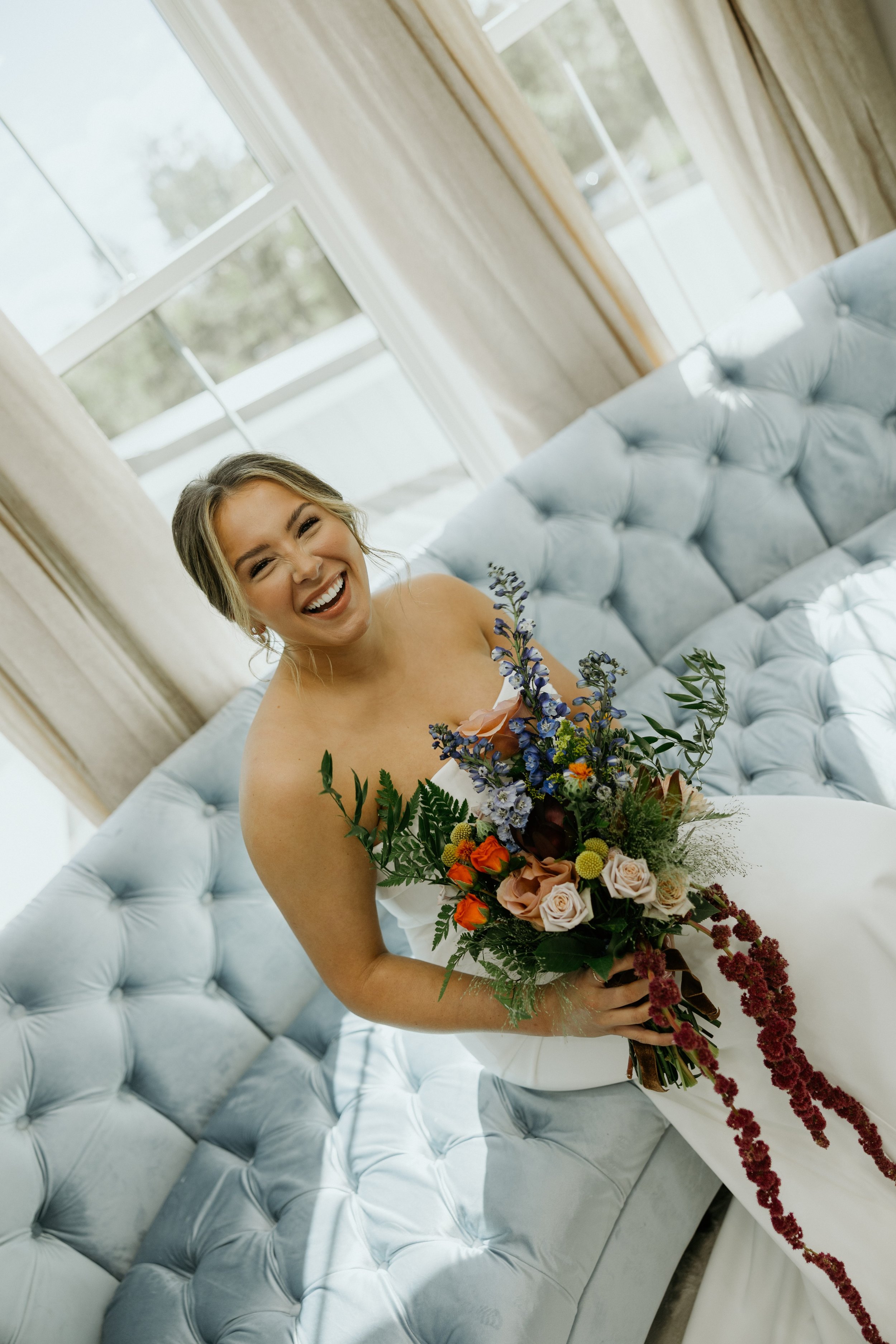 brandi on blue couch.jpg