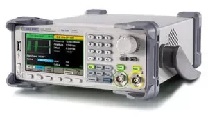 Firefly Light Therapy's Frequency Scanner, with a large digital display, multiple buttons, and various input/output ports.