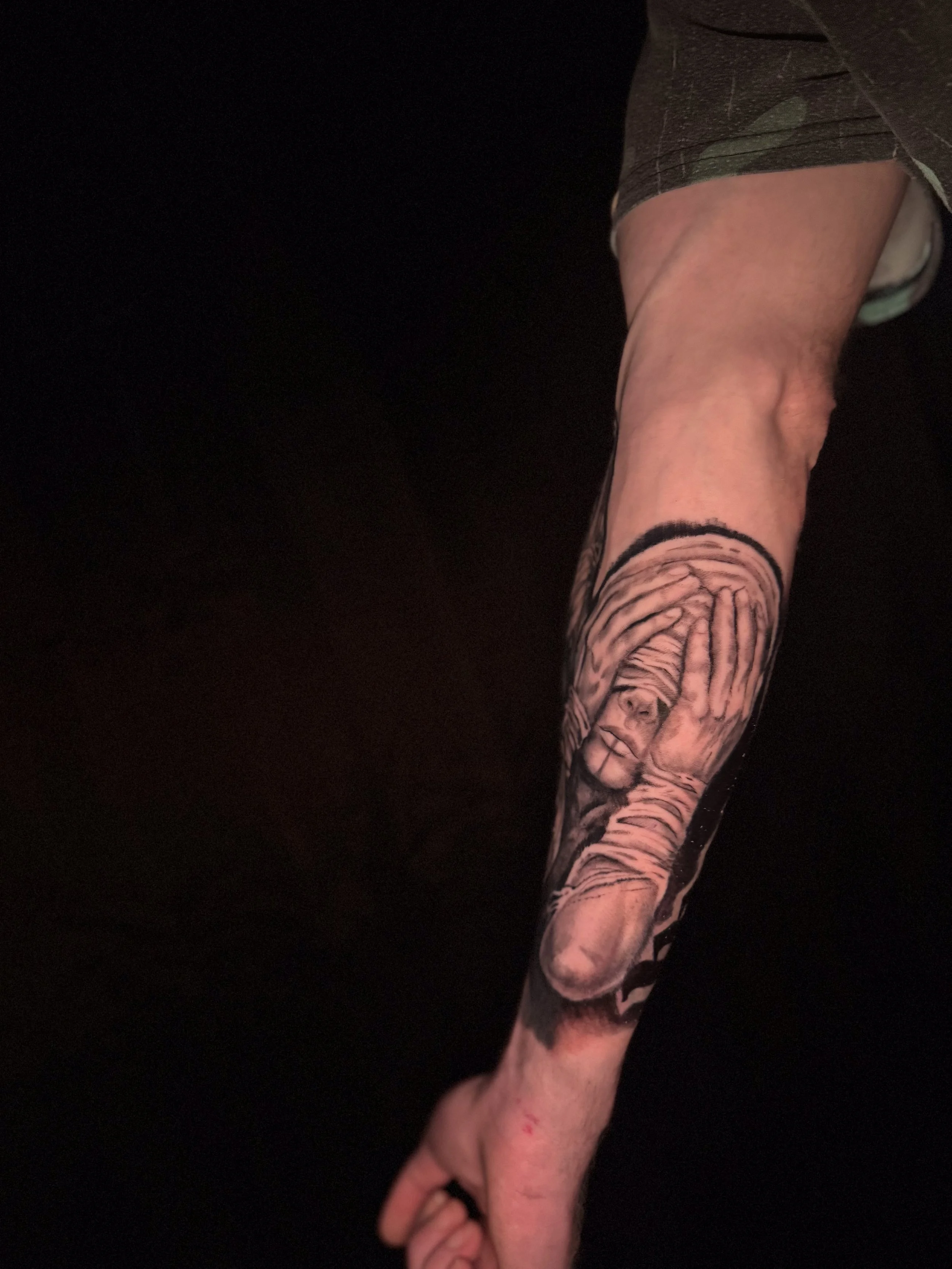 surreal see no evil black and grey tattoo.