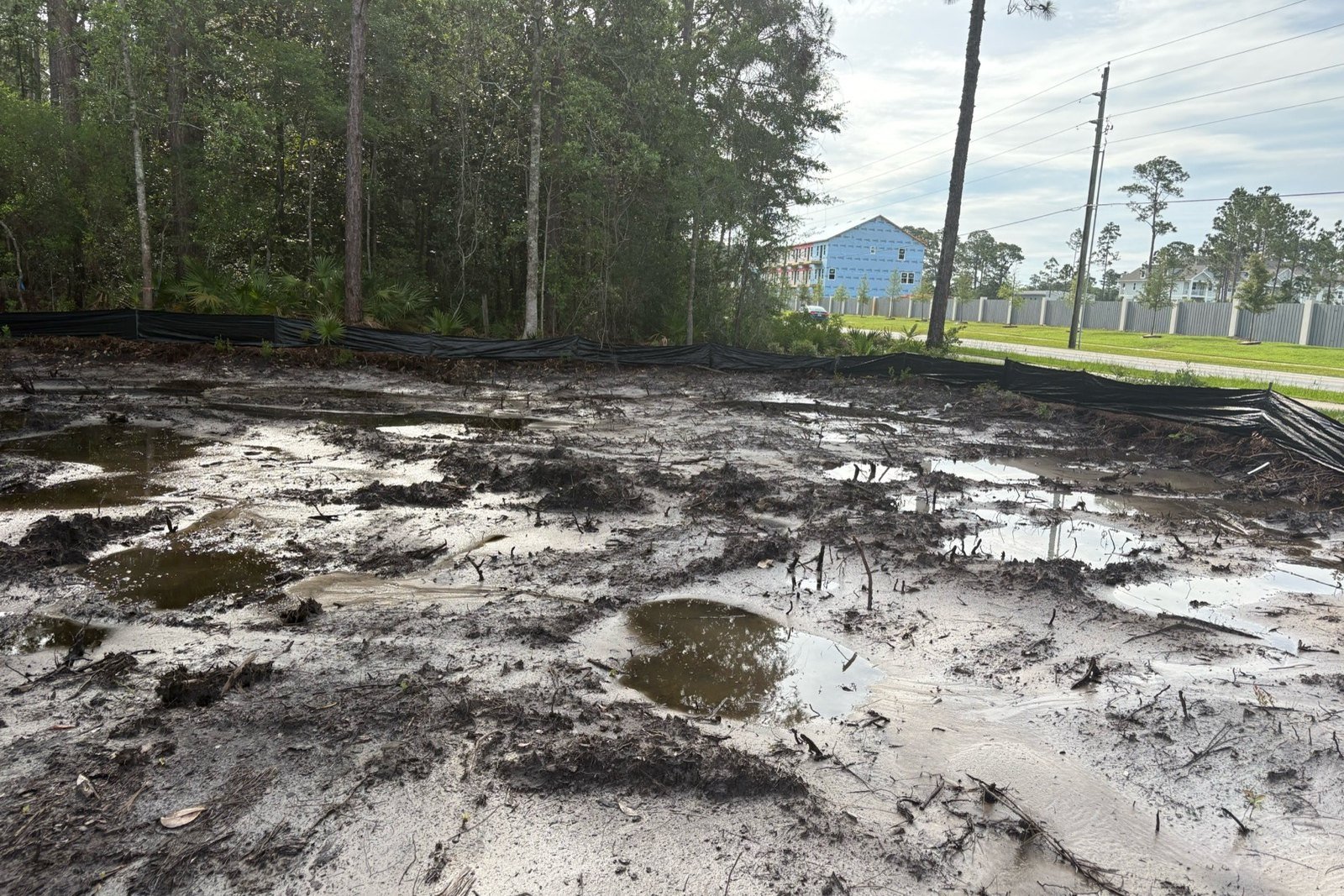 Why Your Lot Floods and How Grading Fixes It
