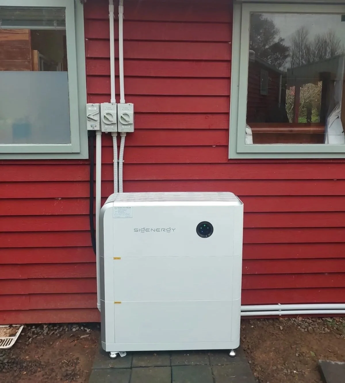 Solar battery storage system installed alongside a residential solar power system.
