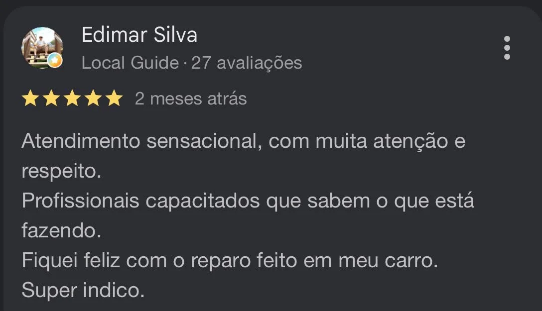 Screenshot of a positive review for an auto repair service in Portuguese, praising the professional attention and the quality of work.
