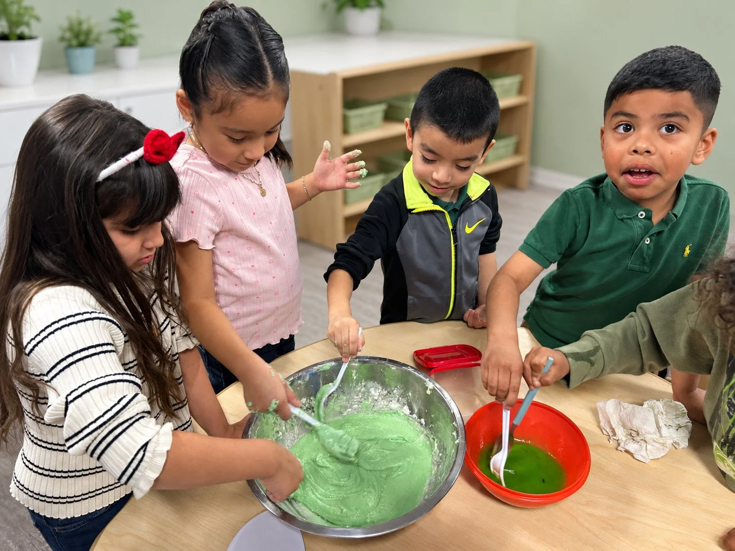 TOL-kids-baking-green-frosting.jpg