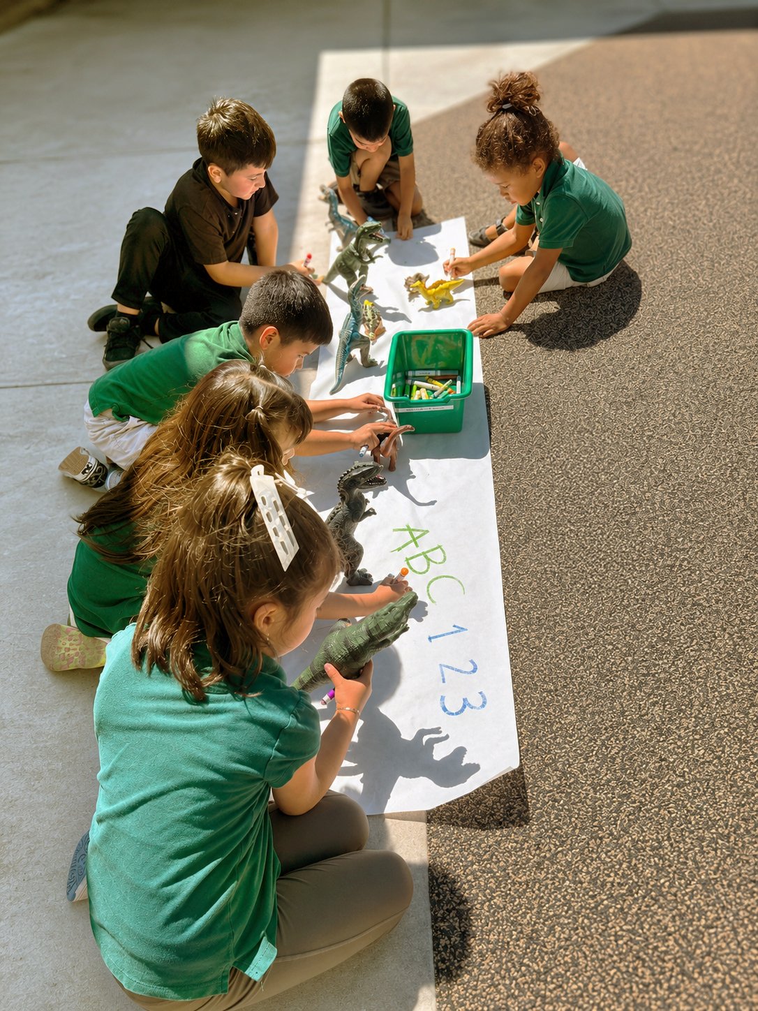 TOL-outside-play-dinasours.jpg
