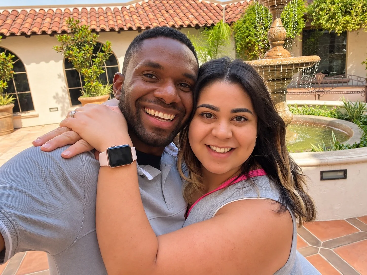 Shane and Betsy from Poema Media smiling together on location.