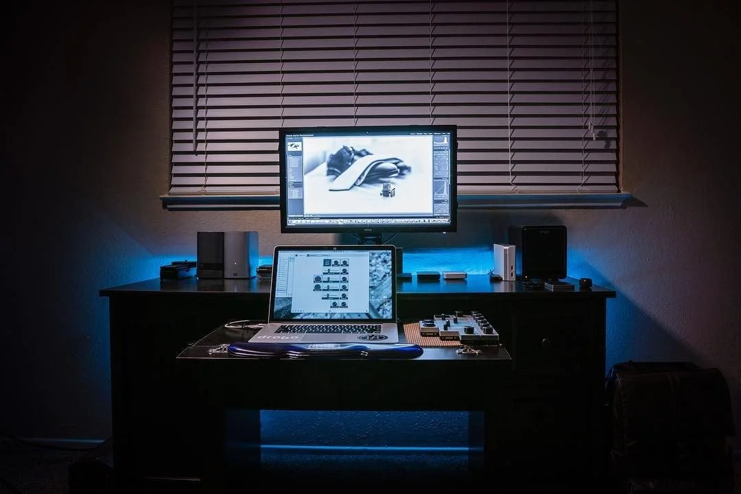 Poema Media editing workspace with a laptop and external monitor.