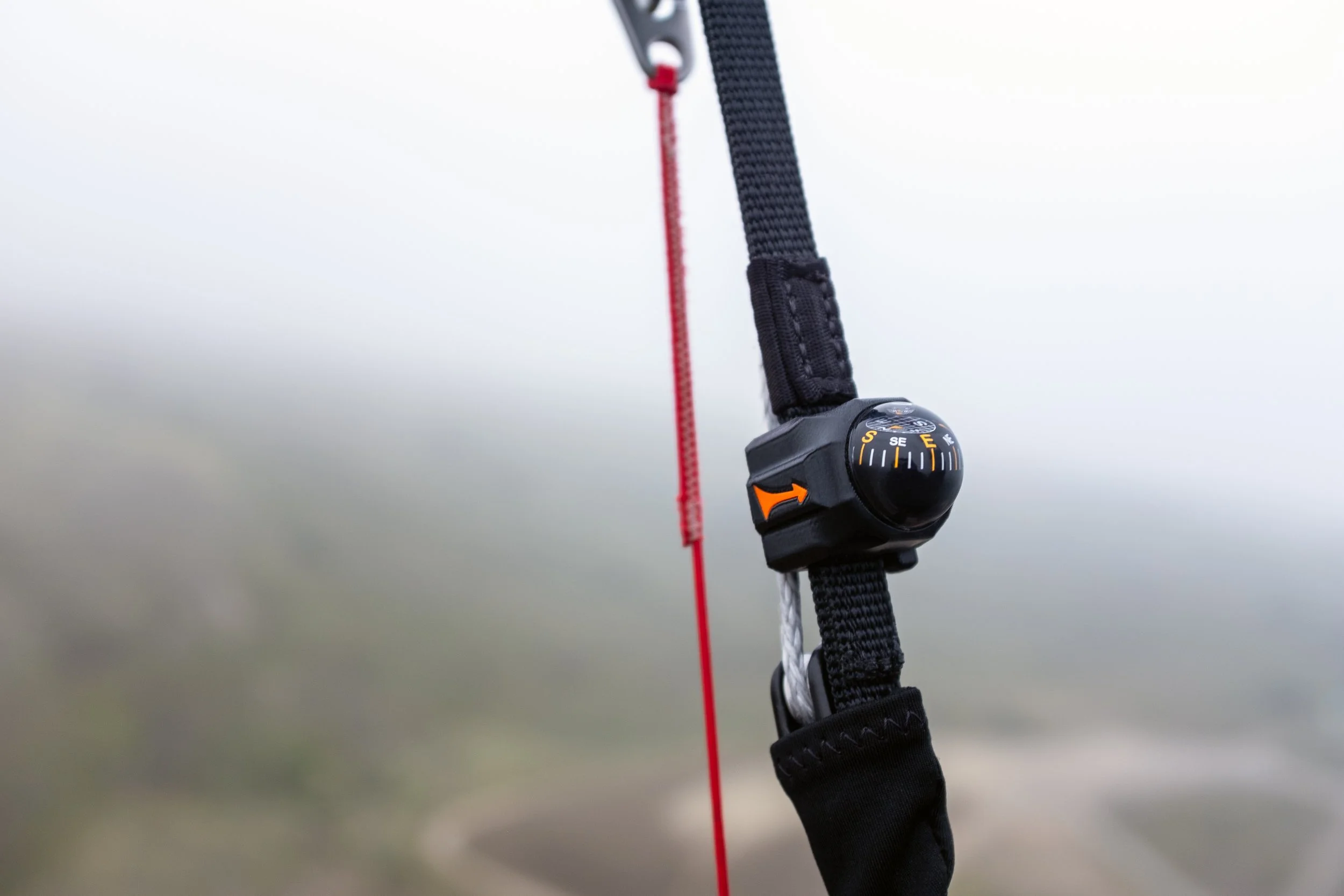 Paraglider compass in flight closeup