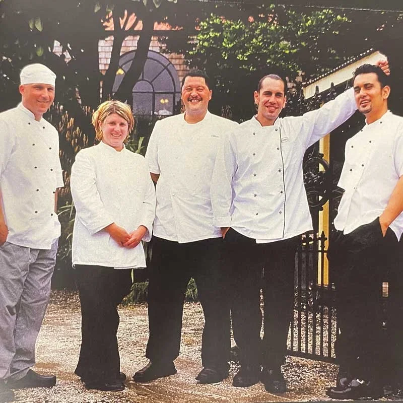 Archive photo of Rex Morgan with fellow chefs in chef whites outside, from the Citron era