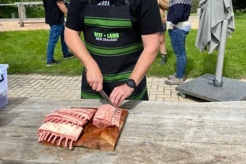 Chef prepping lamb racks from Royalburn Station
