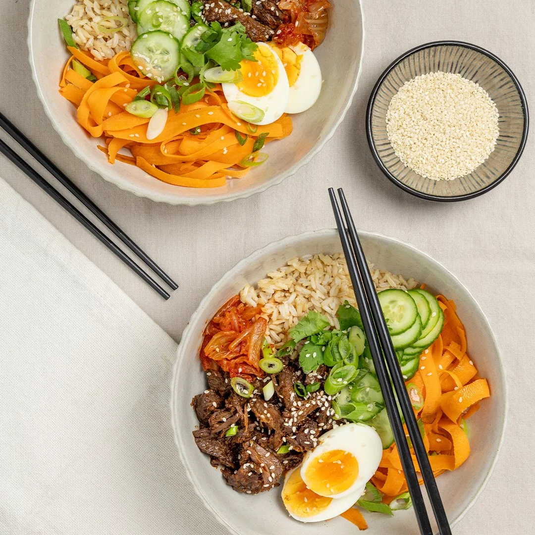 Sticky soy wagyu beef bowls with vegetables and boiled eggs