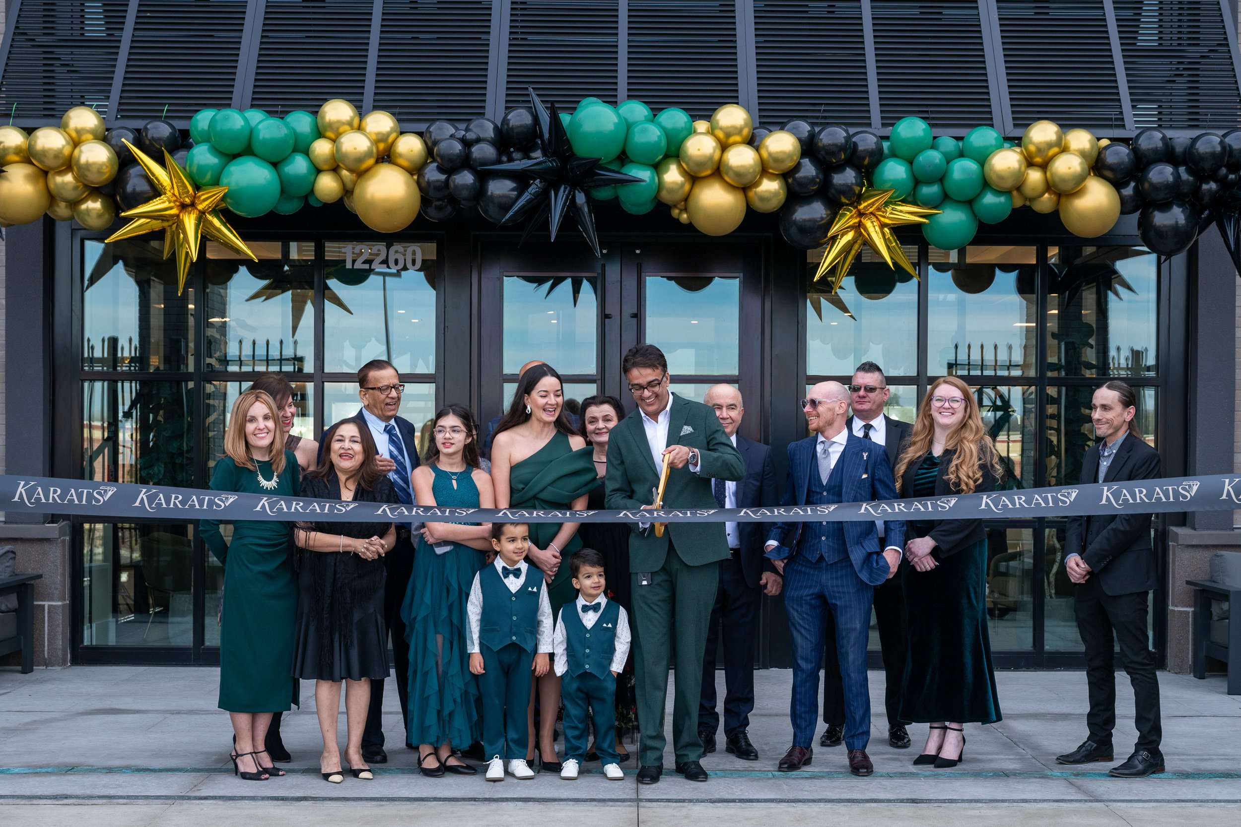 Ribbon-cutting ceremony celebrating the opening of the Karats Jewelers flagship store.