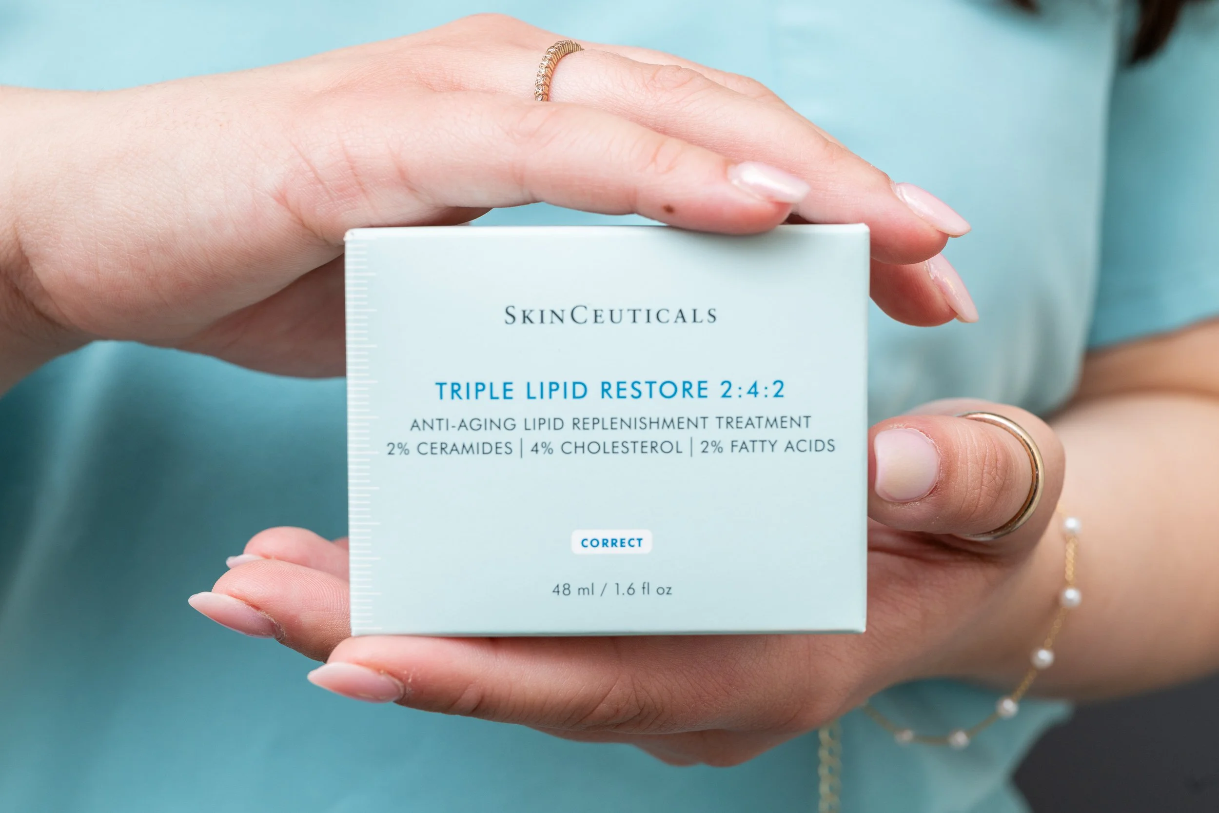 SkinCeuticals Triple Lipid Restore cream photographed for Bella Derma product marketing.