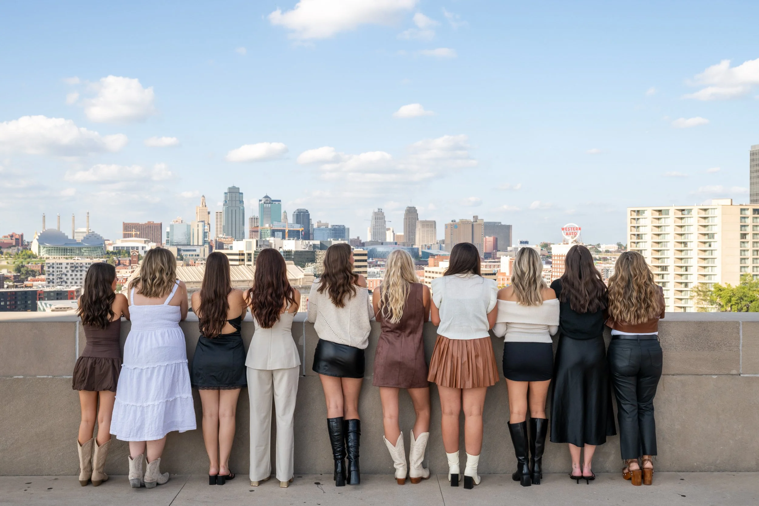 Hyde Salon team overlooking the Kansas City skyline.