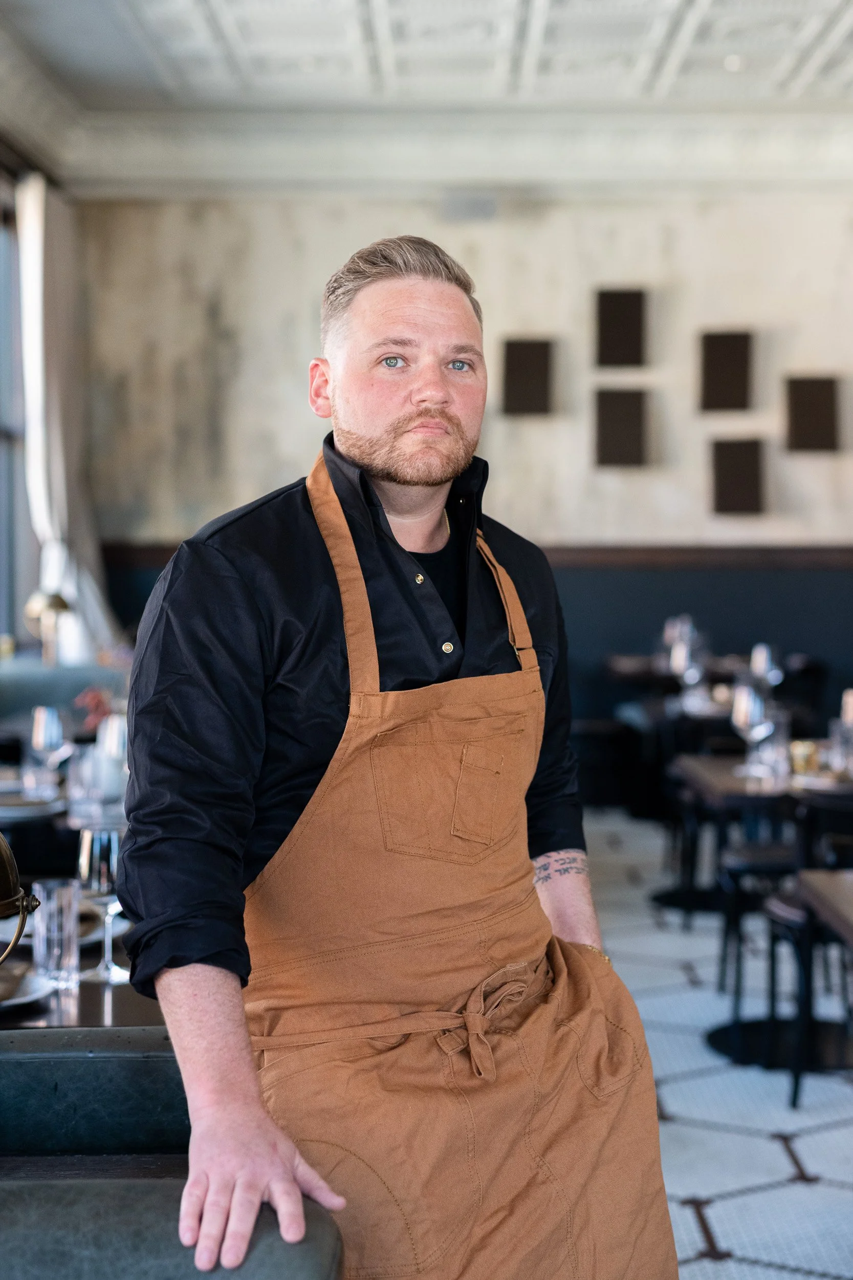 Kansas City food photographer Joe Zlatnik - chef portrait in restaurant dining room