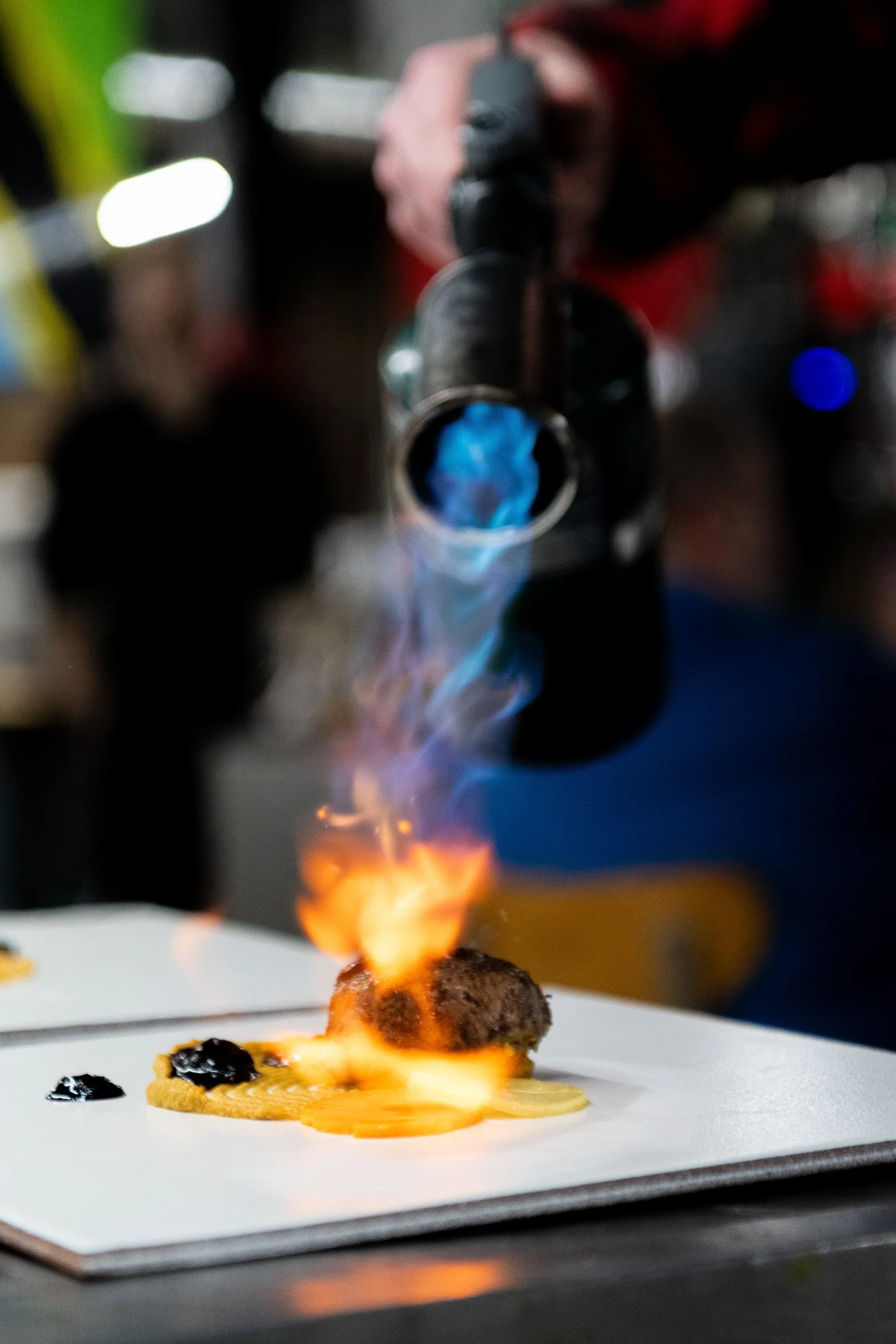 Kansas City food photographer Joe Zlatnik - KMRA torch flambé plating dinner service