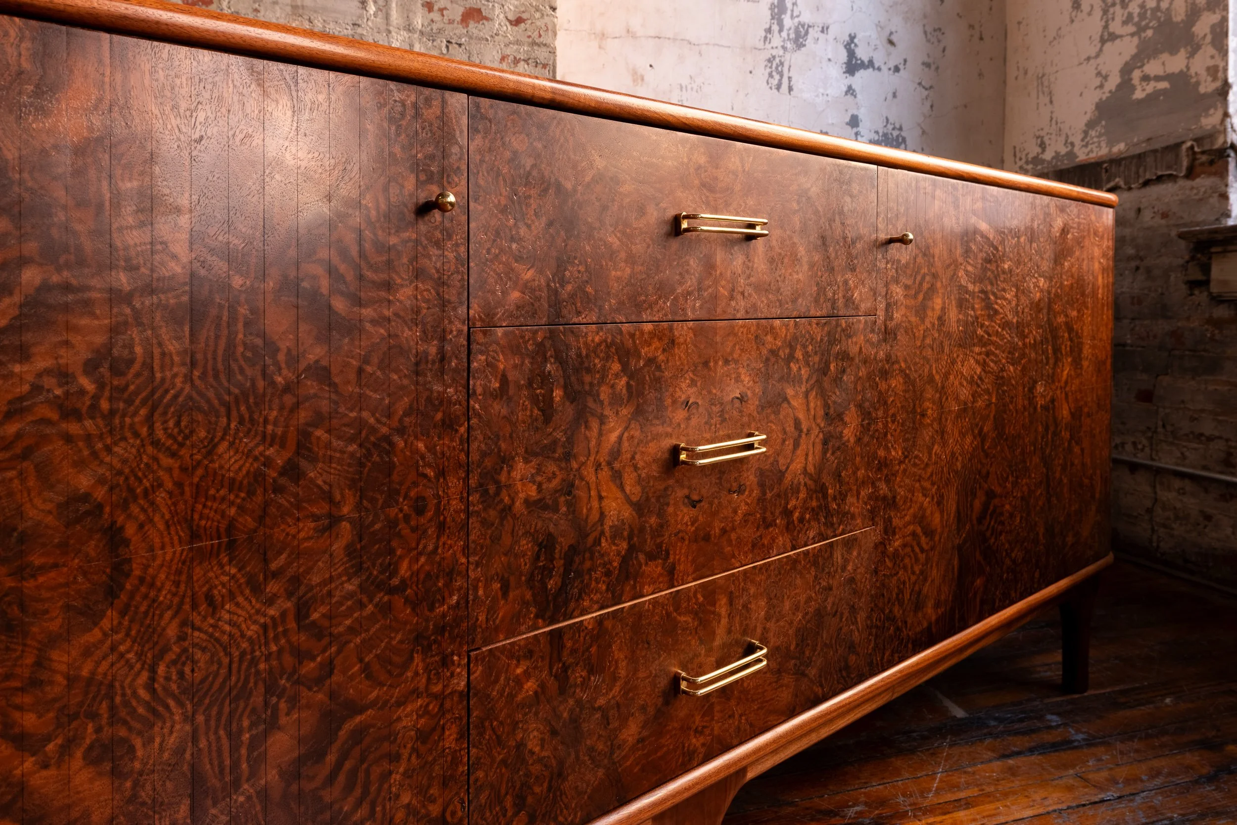 Handcrafted walnut credenza built by Muse Furniture & Design.