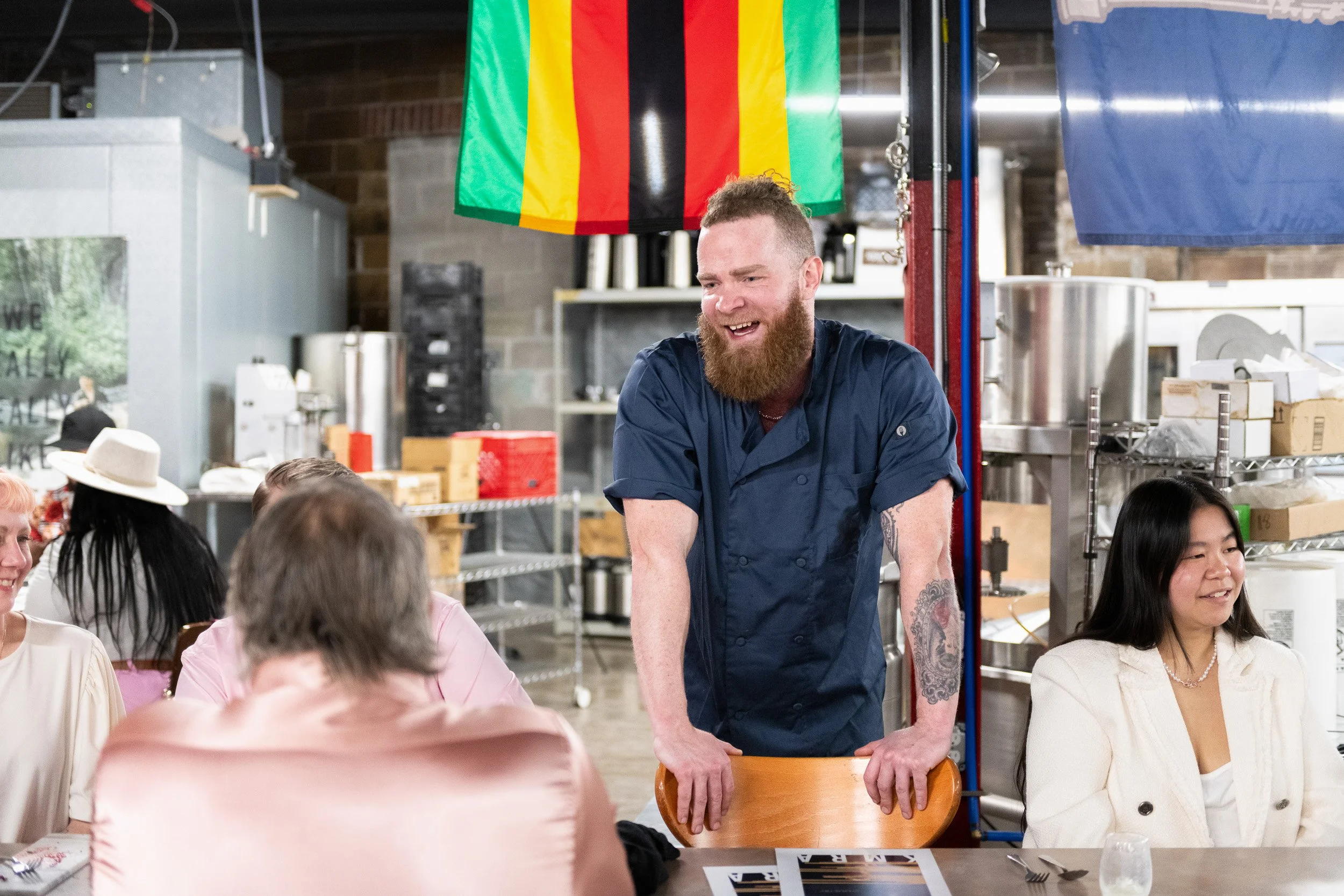 Kansas City brand photographer Joe Zlatnik - KMRA tasting club chef engaging dinner guests