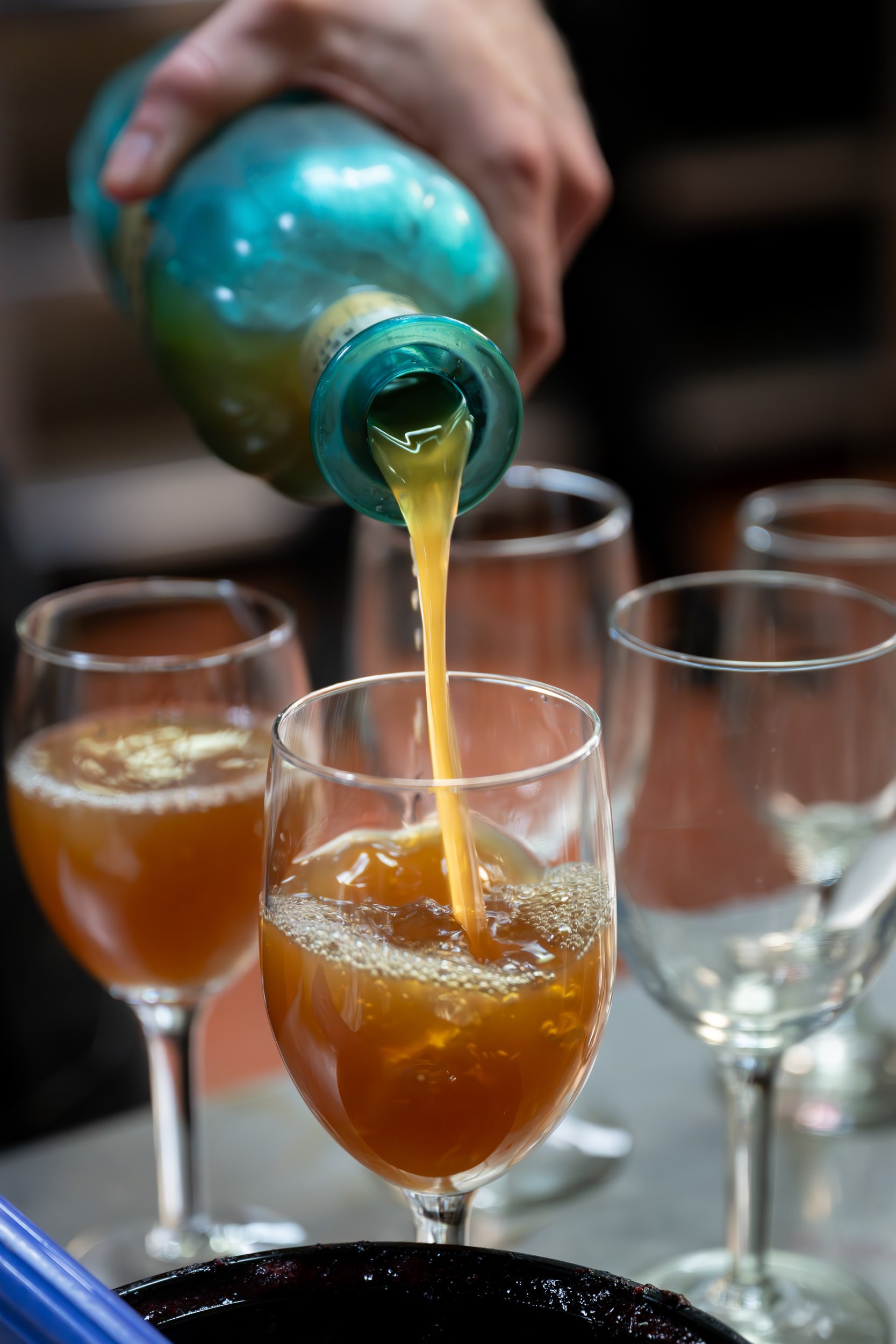 Cocktail being poured during KMRA dinner service.