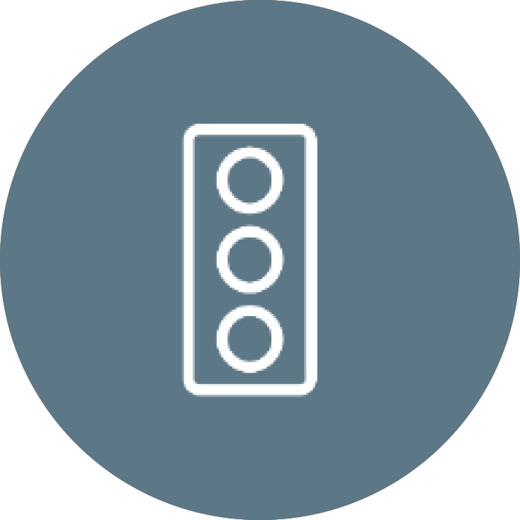 Icon of a traffic light with three circles inside a rounded rectangle.