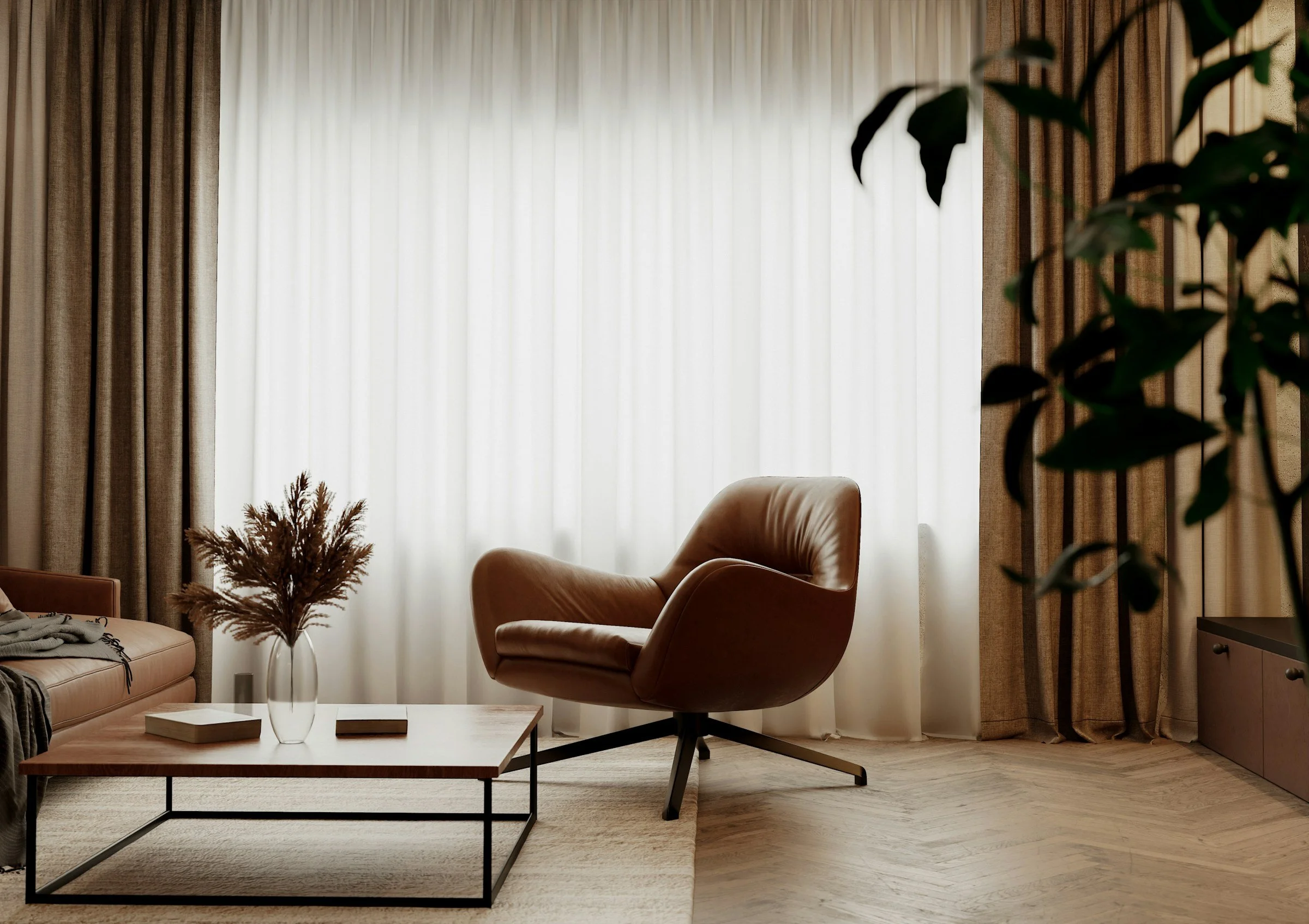 Living room with beige sofa, brown leather chair, wooden coffee table, decorative plants, light-colored curtains, and a small side table.
