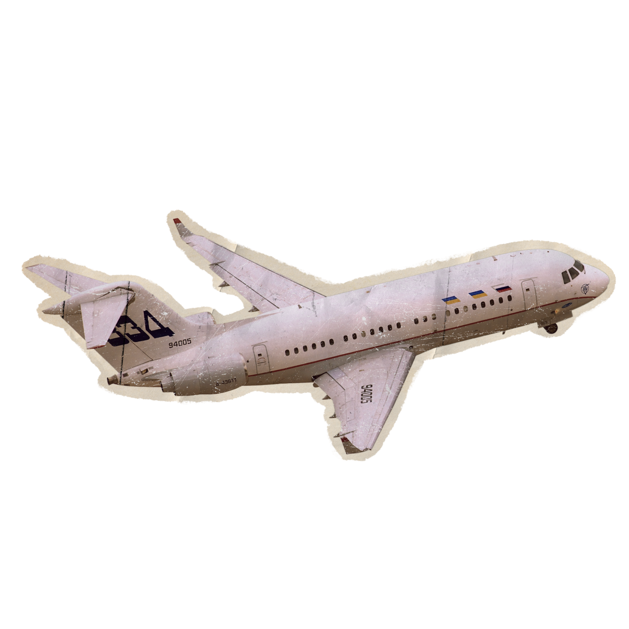 A paper model of an airplane with a mostly white exterior, showing visible panel lines and markings, viewed from a three-quarters angle.