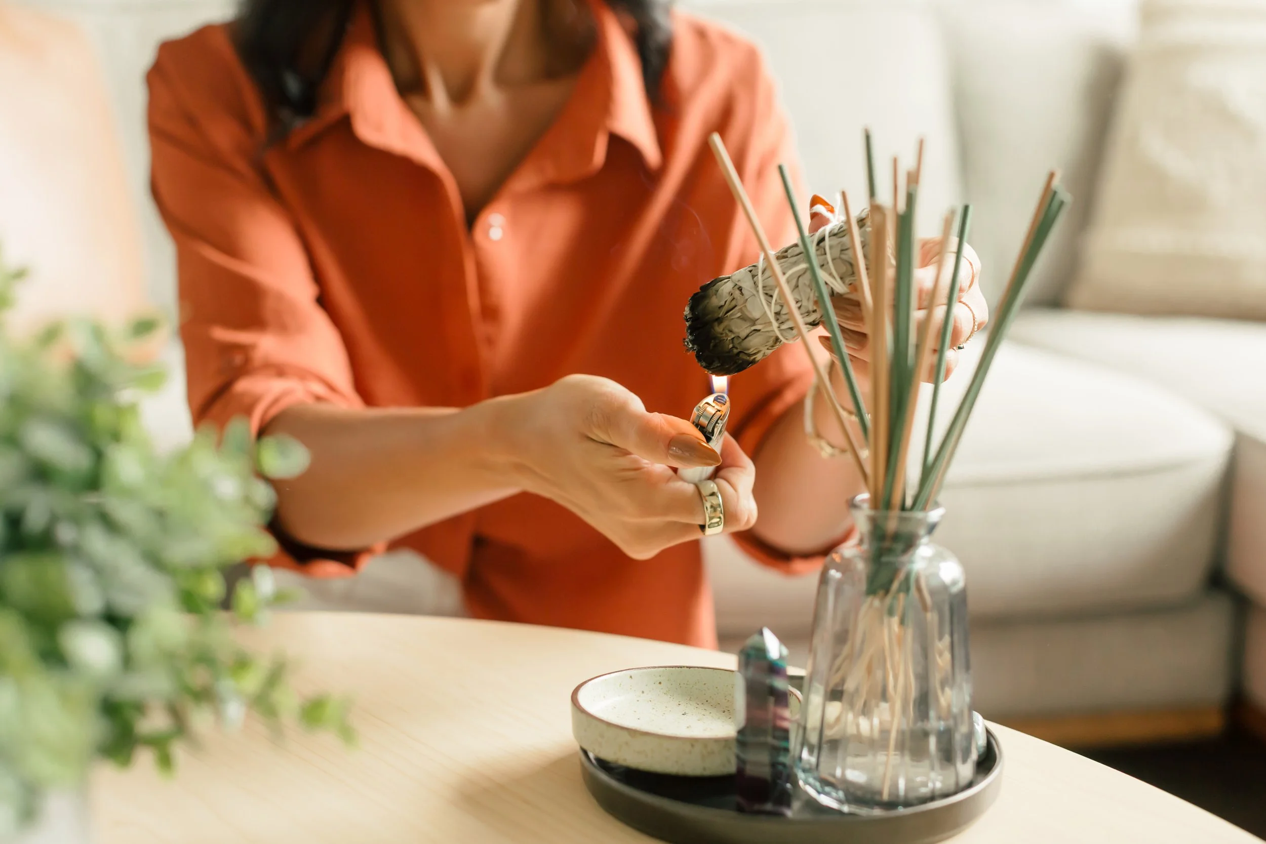 Psychedelic practitioner with burning sage