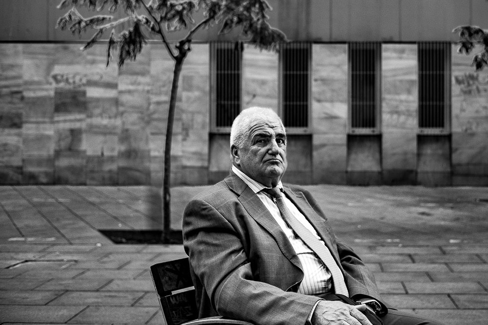 Man on bench, Barcelona, Spain