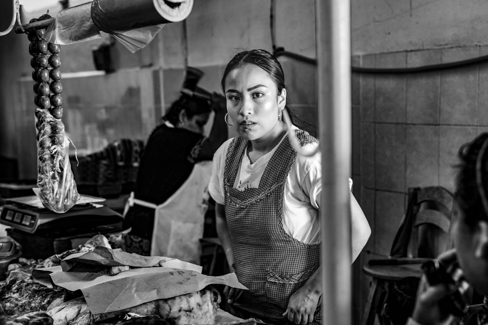 BUTCHER IN MARKET, OAXACA, MEXICO.jpg